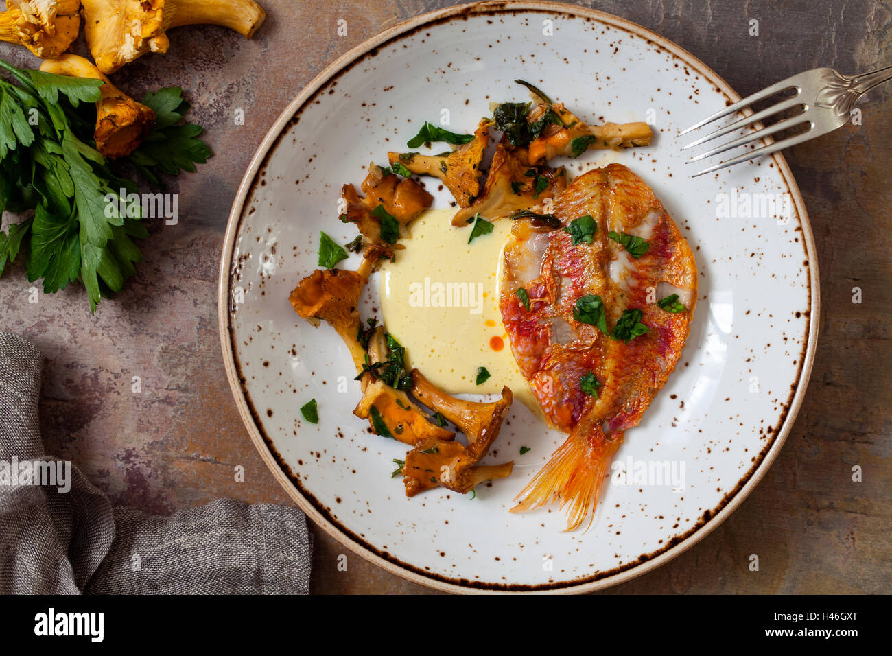 Red mullet with garlic aioli and chanterelle mushrooms Stock Photo Alamy
