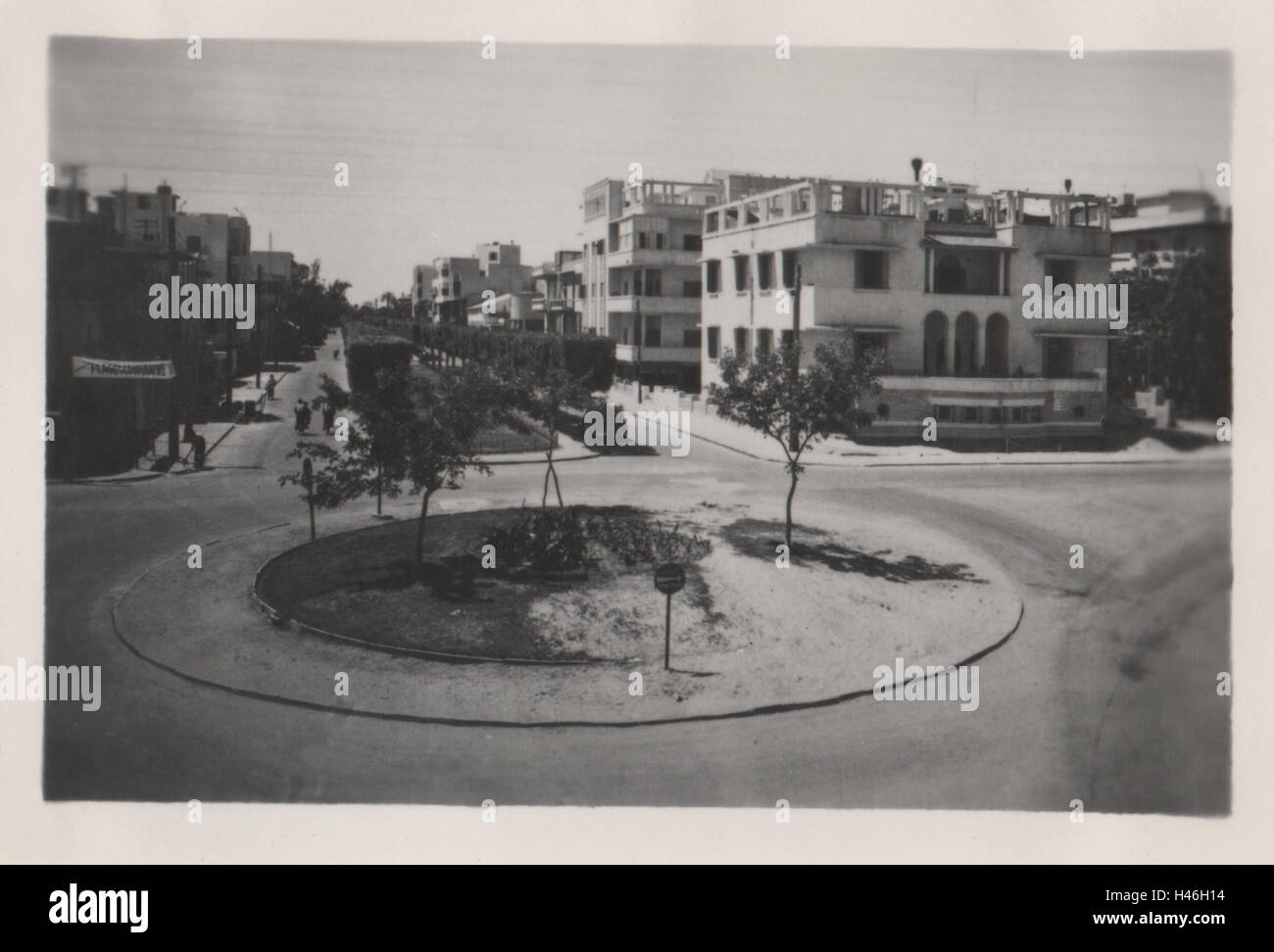 Boulevard Sultan Hussein in Ismailia Egypt with city buildings in the background. Photographed in 1952 Stock Photo
