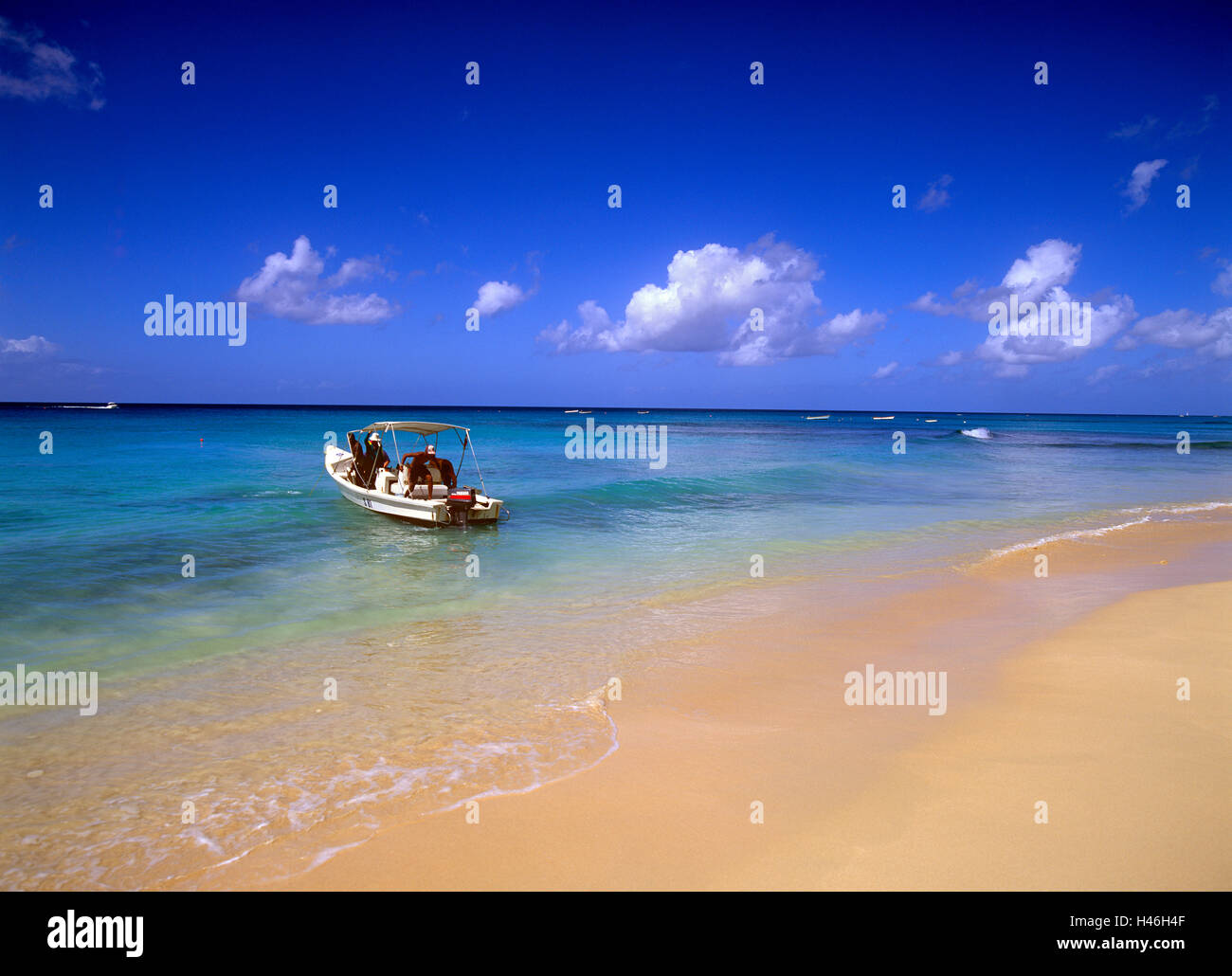 Speed Boat on Lonestar Beach, Barbados Stock Photo