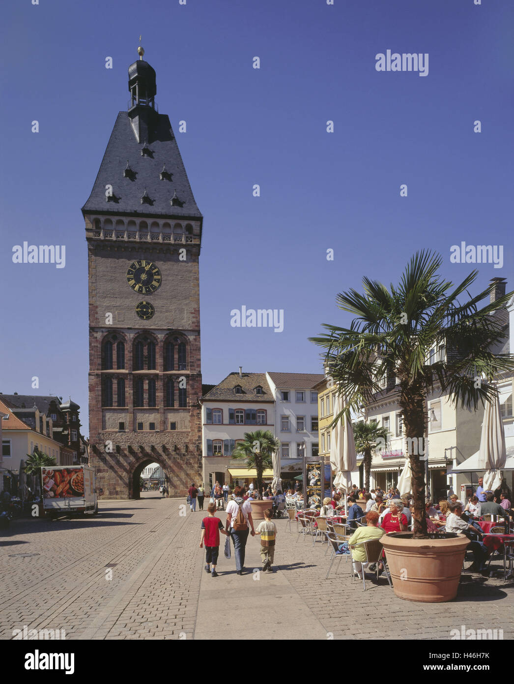 Germany, Rhineland-Palatinate, Speyer, Altpörtel, Maximilianstrasse, cafes, tourists, no model release, town, destination, place of interest, palm, street cafe, pedestrian area, town goal, tower, Middle Ages, medievally, clock, cobblestones, goal, dusk, architecture, historically, people, tourism, Stock Photo