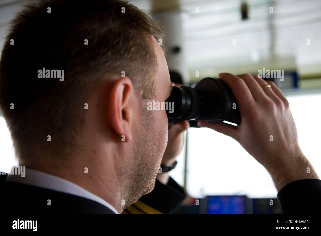 Norway, Hurtigruten (ships), 'MS Kong Harald', bridge, officer, binoculars, Stock Photo