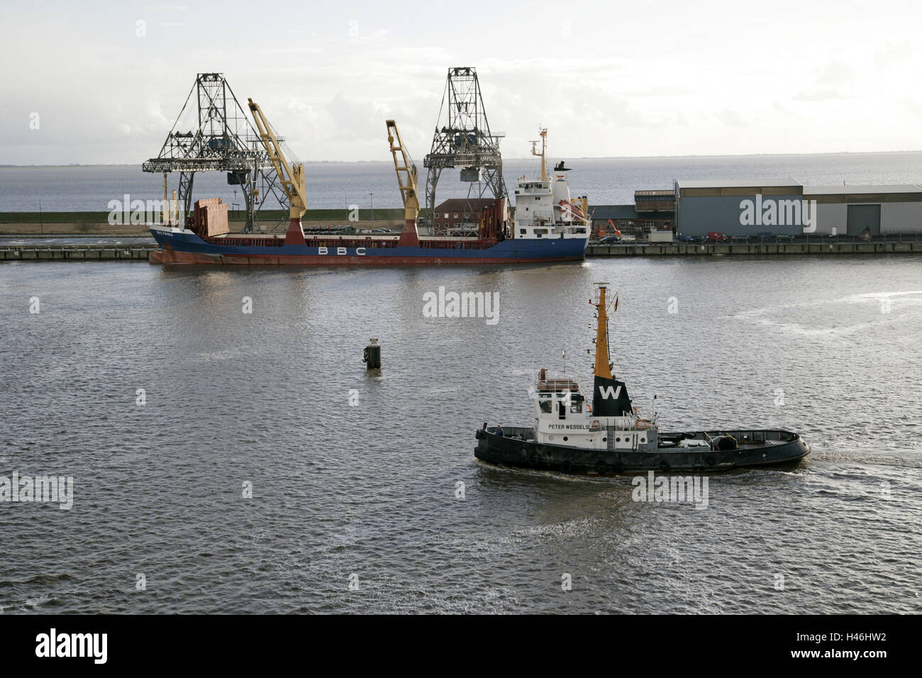Germany, Lower Saxony, East Friesland, Emden, harbour, tractor Stock