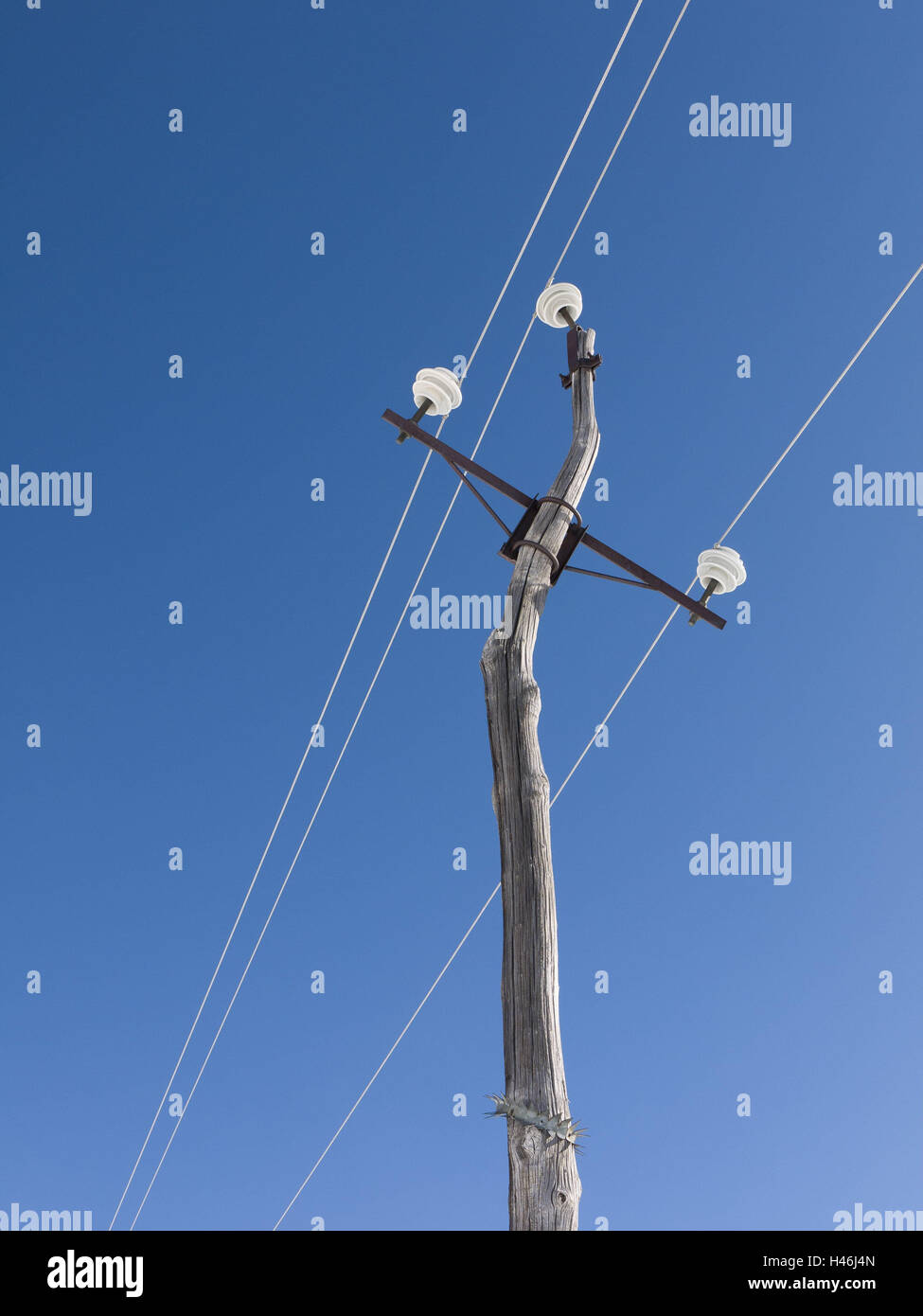 Power supply line, sky, blue Stock Photo - Alamy