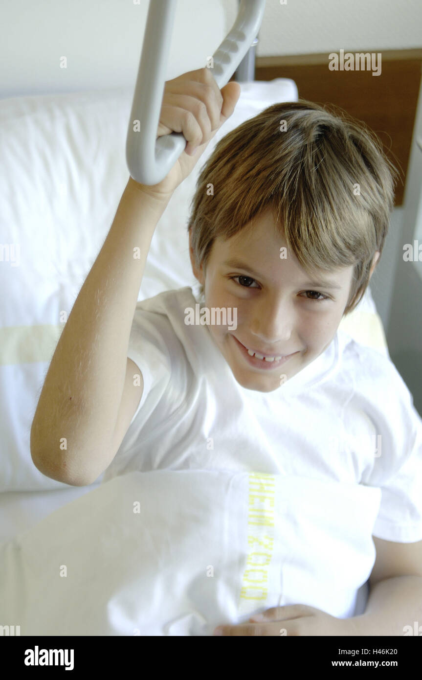boy, hospital bed, smiling, gaze camera Stock Photo Alamy