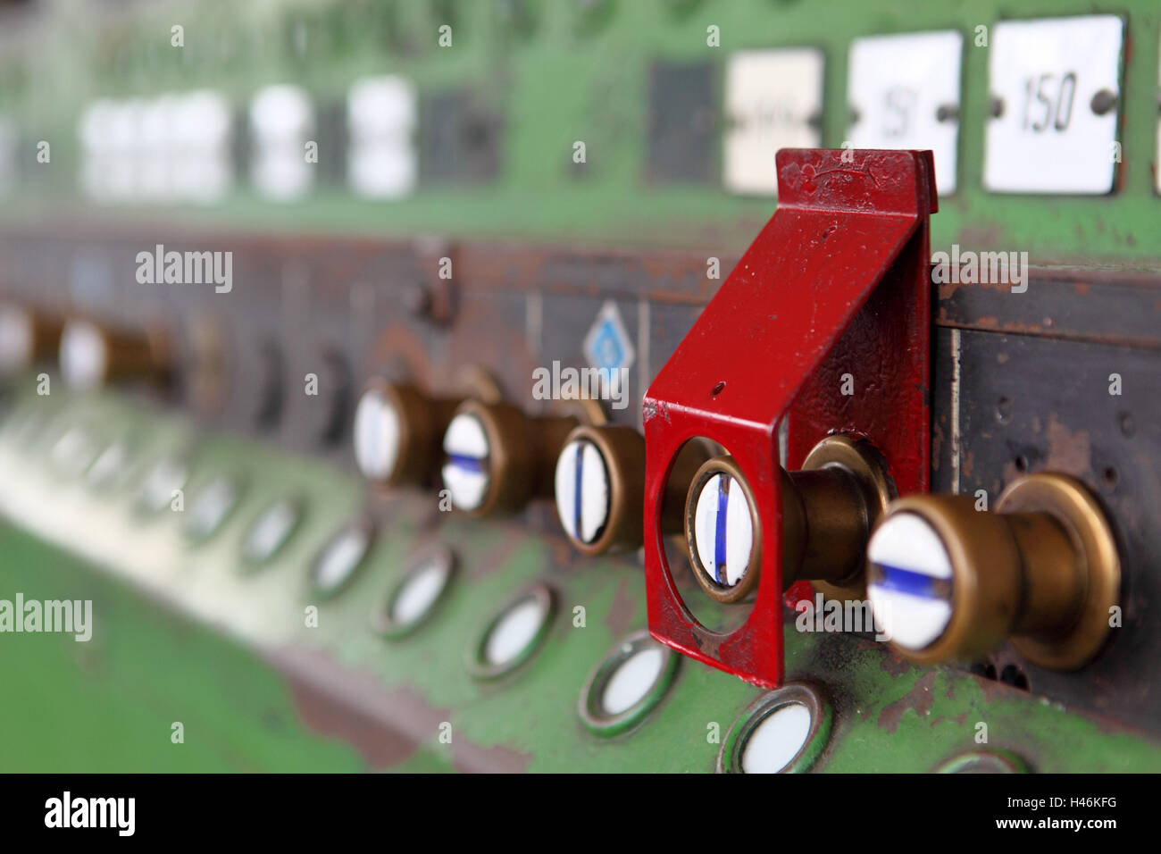 Red umlegter button in old trajectory signal box Stock Photo - Alamy