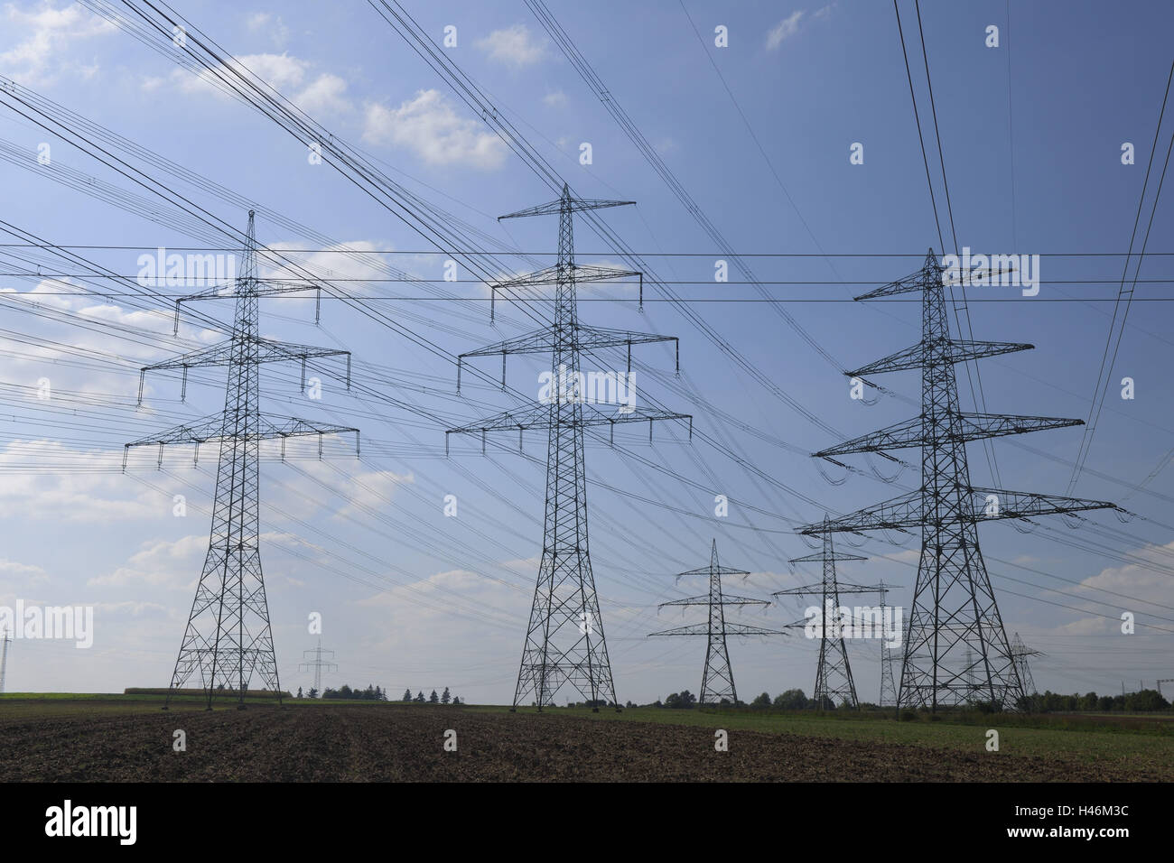 Hightension power lines, power poles Stock Photo Alamy