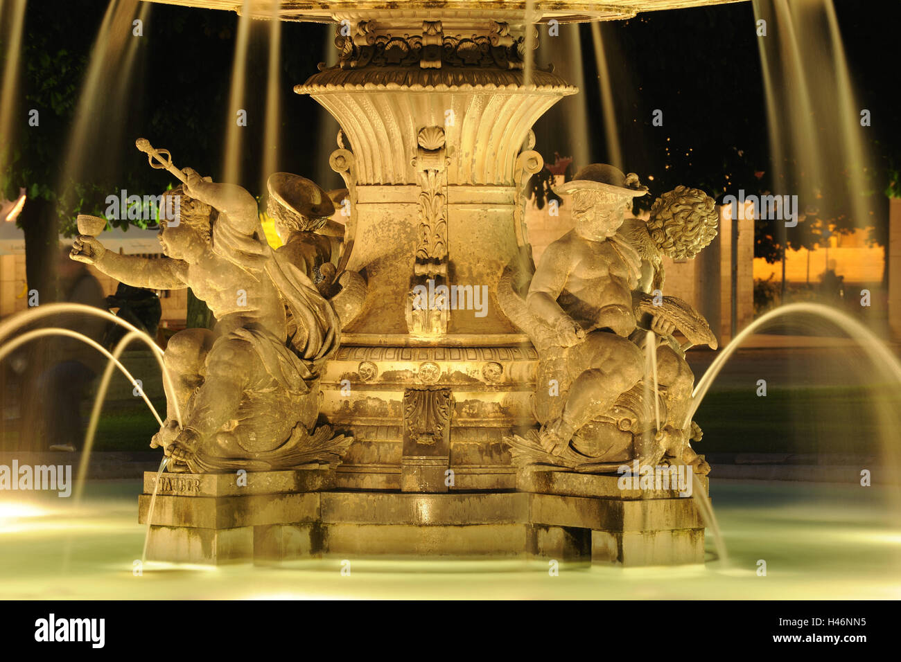 Germany, Baden-Wurttemberg, Stuttgart, fountain, detail, lighting, night, architecture, well, culture, castle square, play water, place of interest, tourism, structure, Pureline, forecourt, destination, nobody, figures, well figures, jets, water jets, Stock Photo
