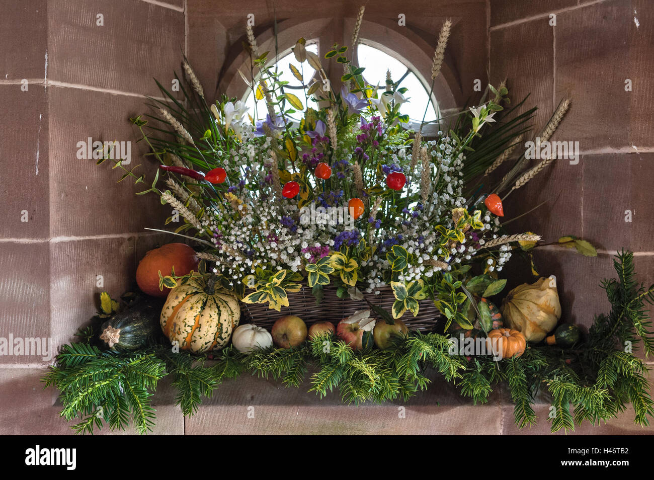 Clungunford, Shropshire, UK. Harvest Festival flower display in St Cuthbert's Church Stock Photo