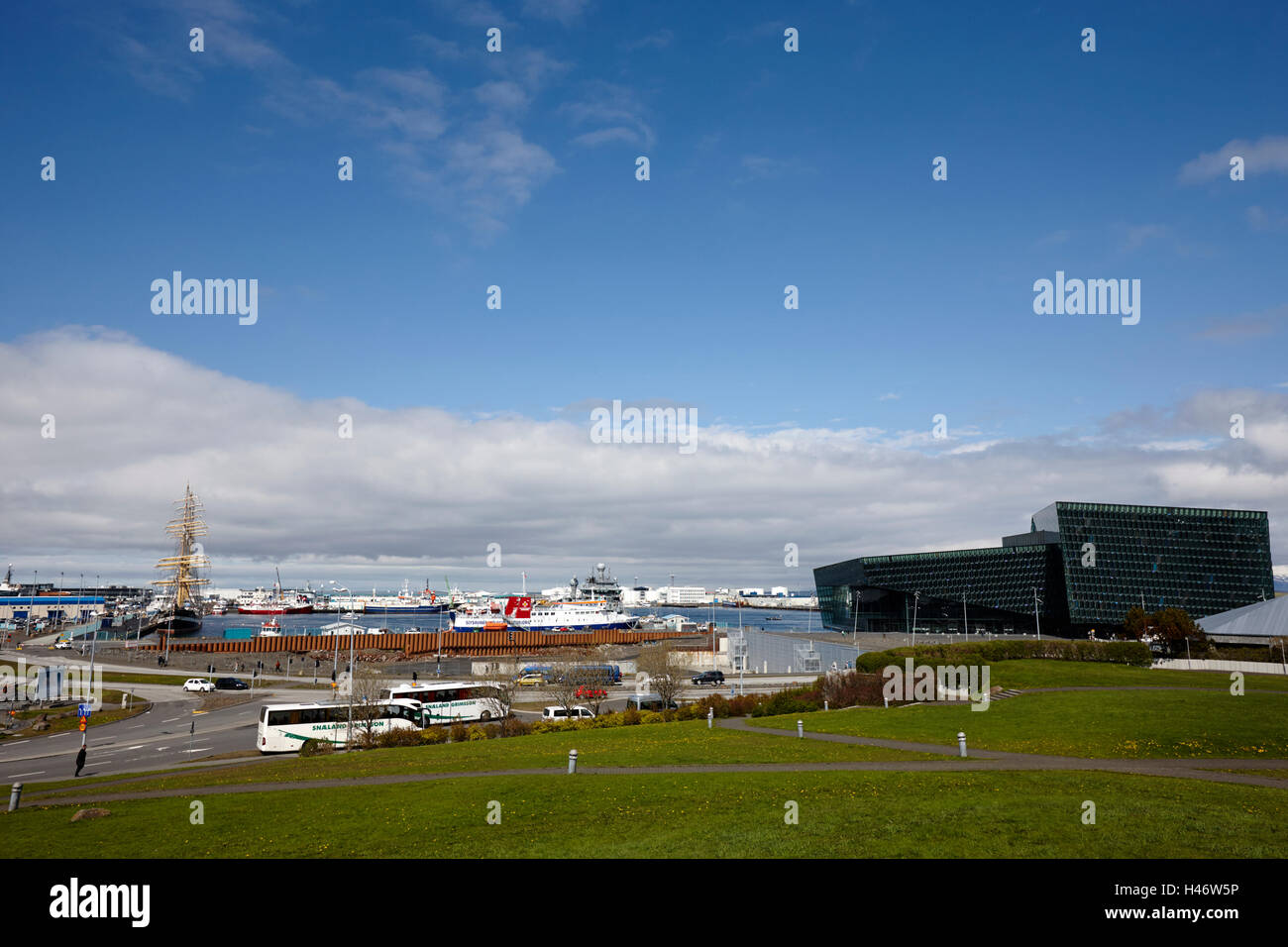 view over reykjavik harbour and harpa concert hall from arnarholl hill park reykjavik Iceland Stock Photo