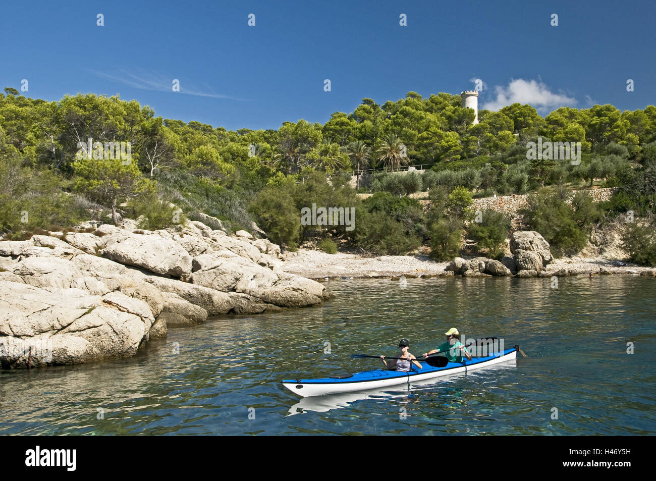 Spain, the Balearic Islands, Majorca, island Dragonera, Cala Lladó, watch-tower, 16. Cent., pines, canoe, Stock Photo