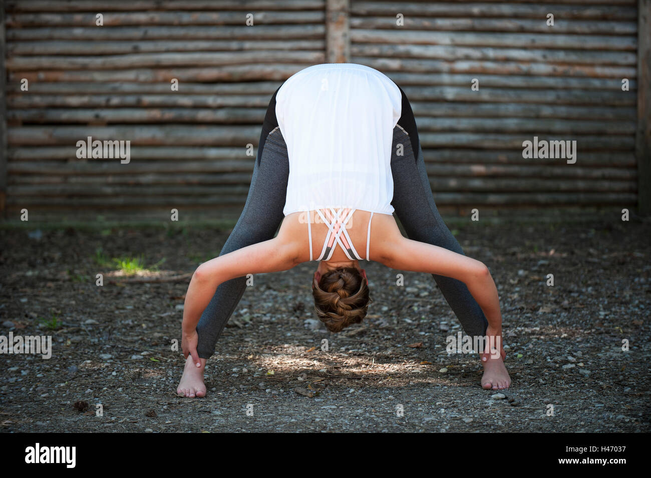 Woman doing yoga exercises Stock Photo