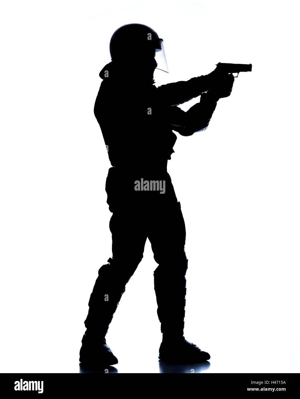 Policeman, protective clothing, stand, gun, shooting practise, aim, shoot silhouette, police, occupation, man, official, police officer, uniform, protective clothing, protection, mask, protective mask, helmet, SEK, MEK, GSG9, special task force, special unit, hands, firearm, weapon, counter-terrorism, preview, Stock Photo