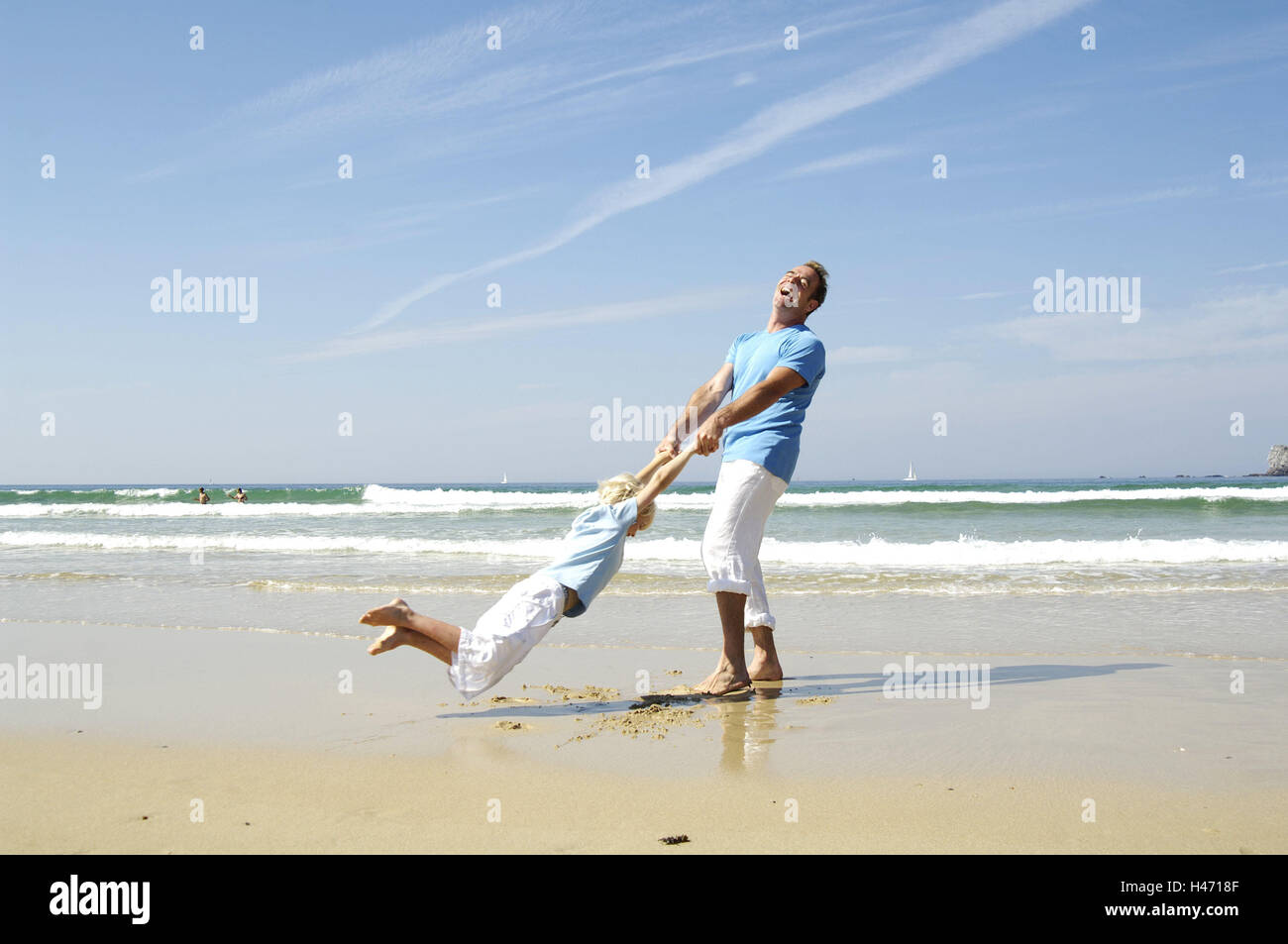Beach, father, son, happy, game, rotate, motion, person, man, parent, child, boy, together, fun, joy, leisurewear, sunny, summer, outside, vacation, family vacation, barefoot, exuberance, cheerfulness, whole body, two, sandy beach, sea, laugh, Stock Photo