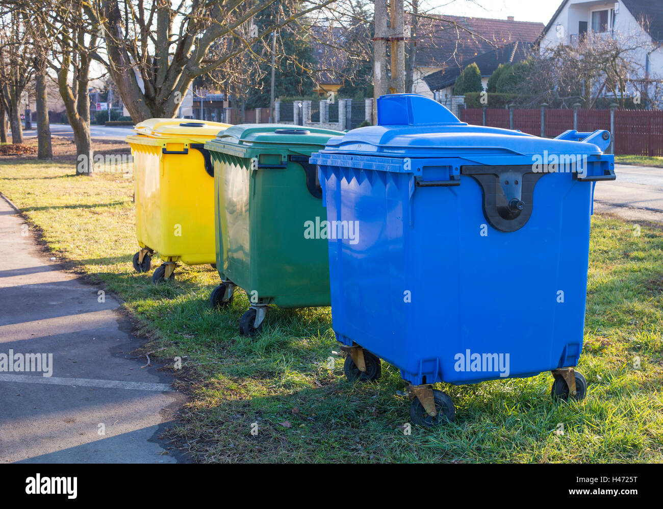 Selective waste bin on the roadside. Stock Photo