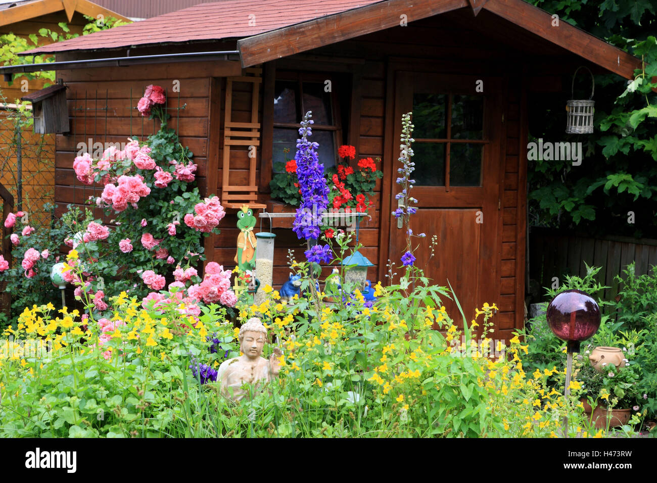 Garden with summer house Stock Photo - Alamy