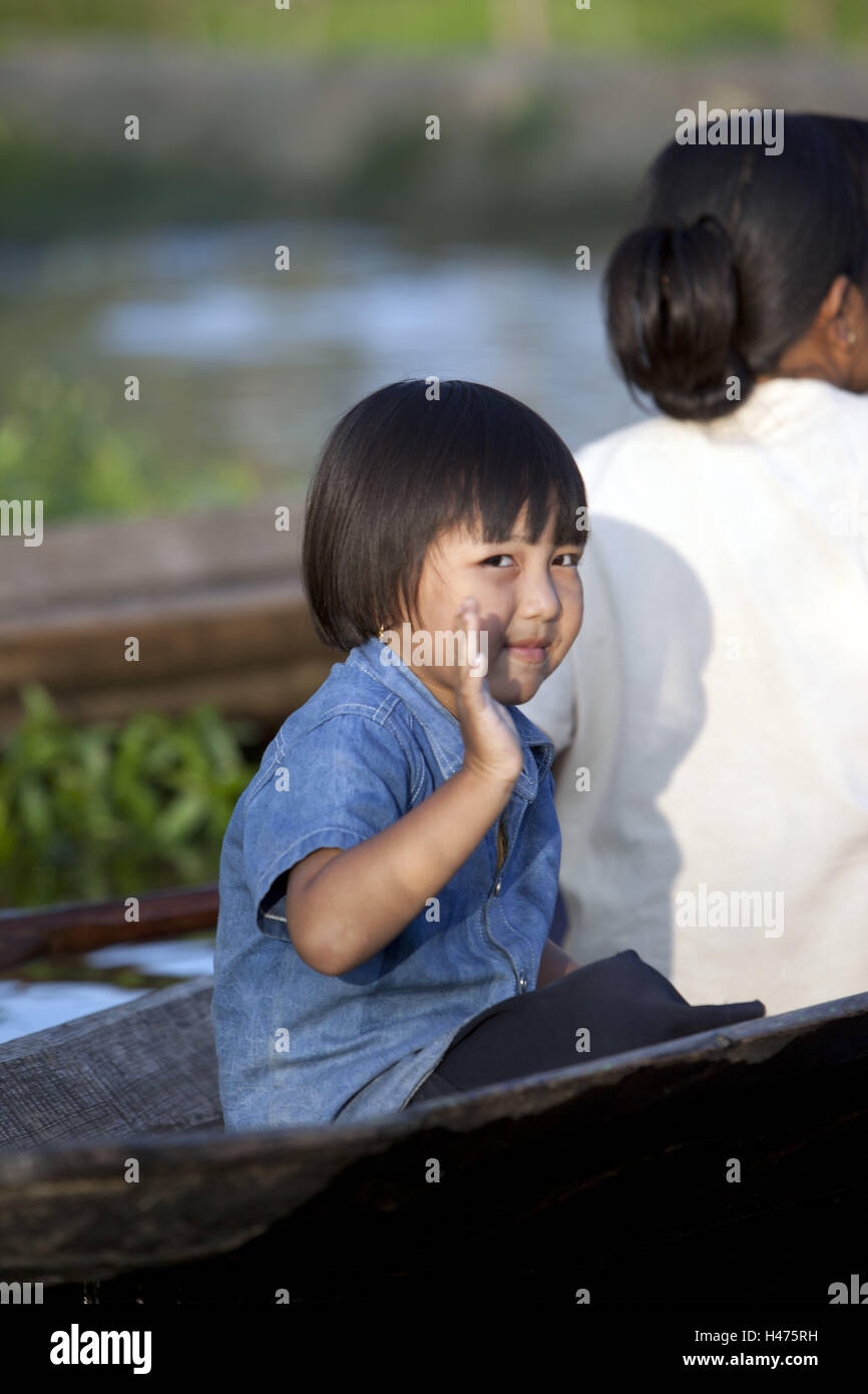 Myanmar, waving child in the boot, Stock Photo