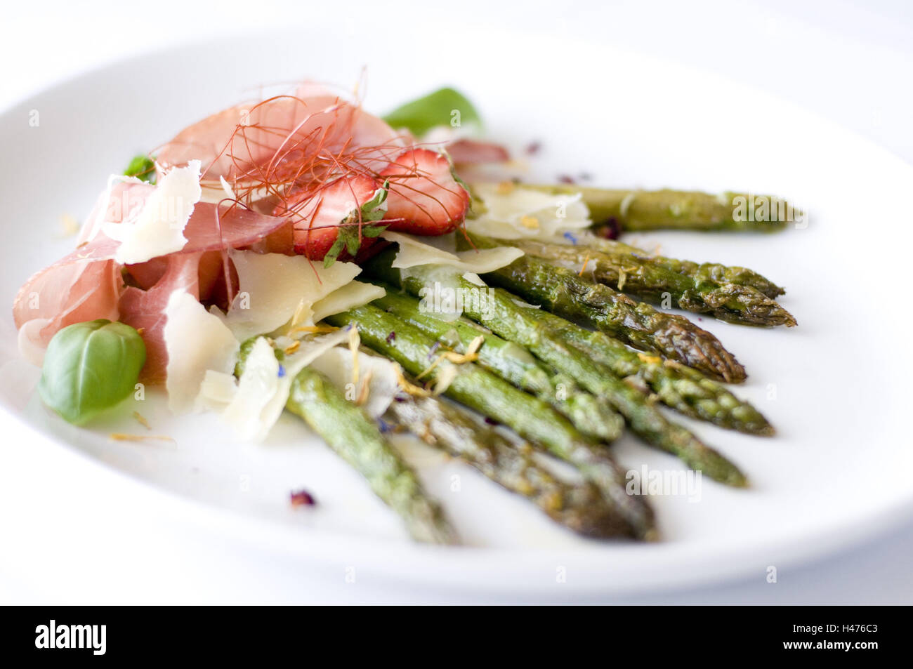 Food, hors-d'oeuvre, green asparagus with ham and parmesan cheese, Stock Photo