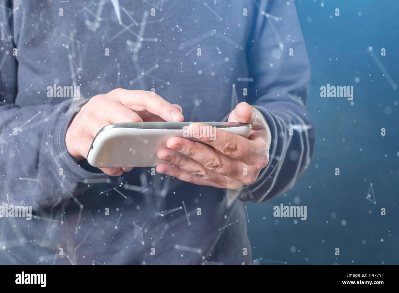 The cyber criminal person using a smart phone in deep web cyberspace. Selective focus. Stock Photo