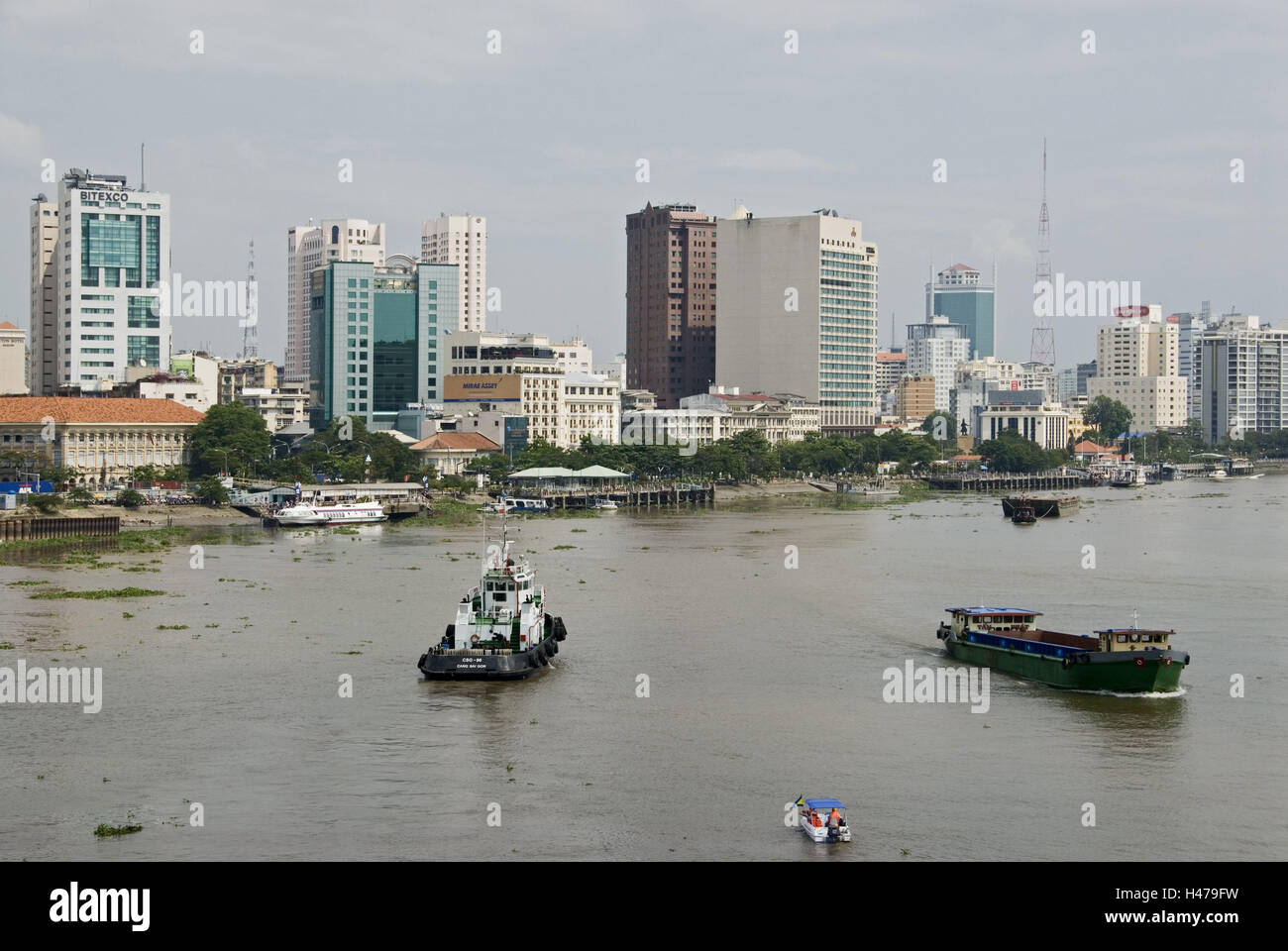 Vietnam, Ho Chi Minh City, high rises, Saigon river, ships, Stock Photo