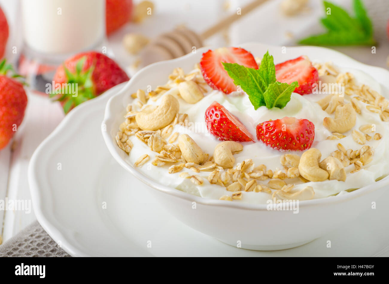 Domestic yogurt with granola strawberries, milk shake Stock Photo Alamy