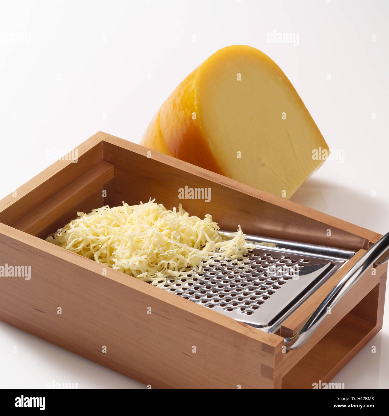 Grating cheese, Stock Photo