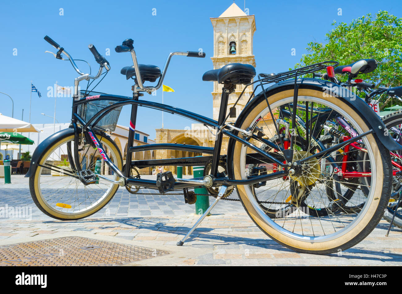 The tandem bicycle stands on the parking next to the St Lazarus church,  Larnaca, Cyprus Stock Photo - Alamy