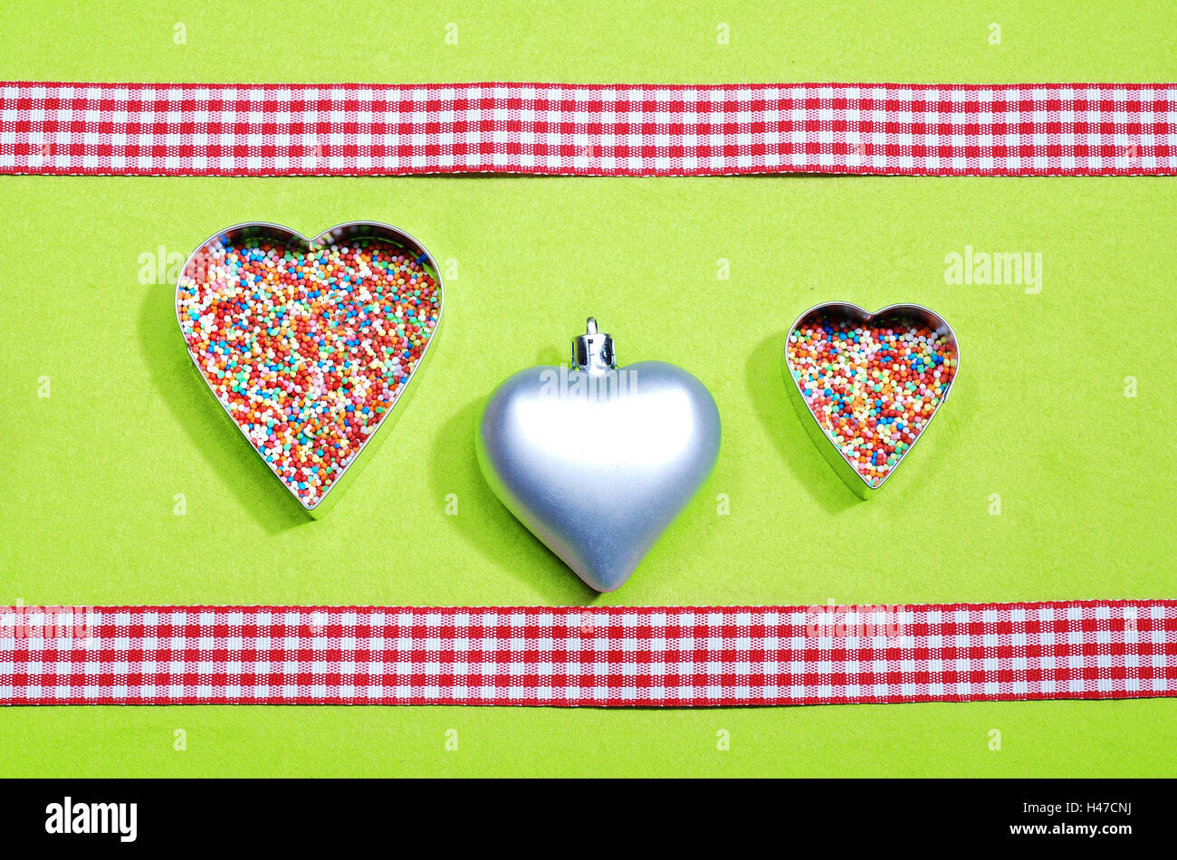 Hearts, pendants, cutters, sugar pearls, square ribbons, Stock Photo
