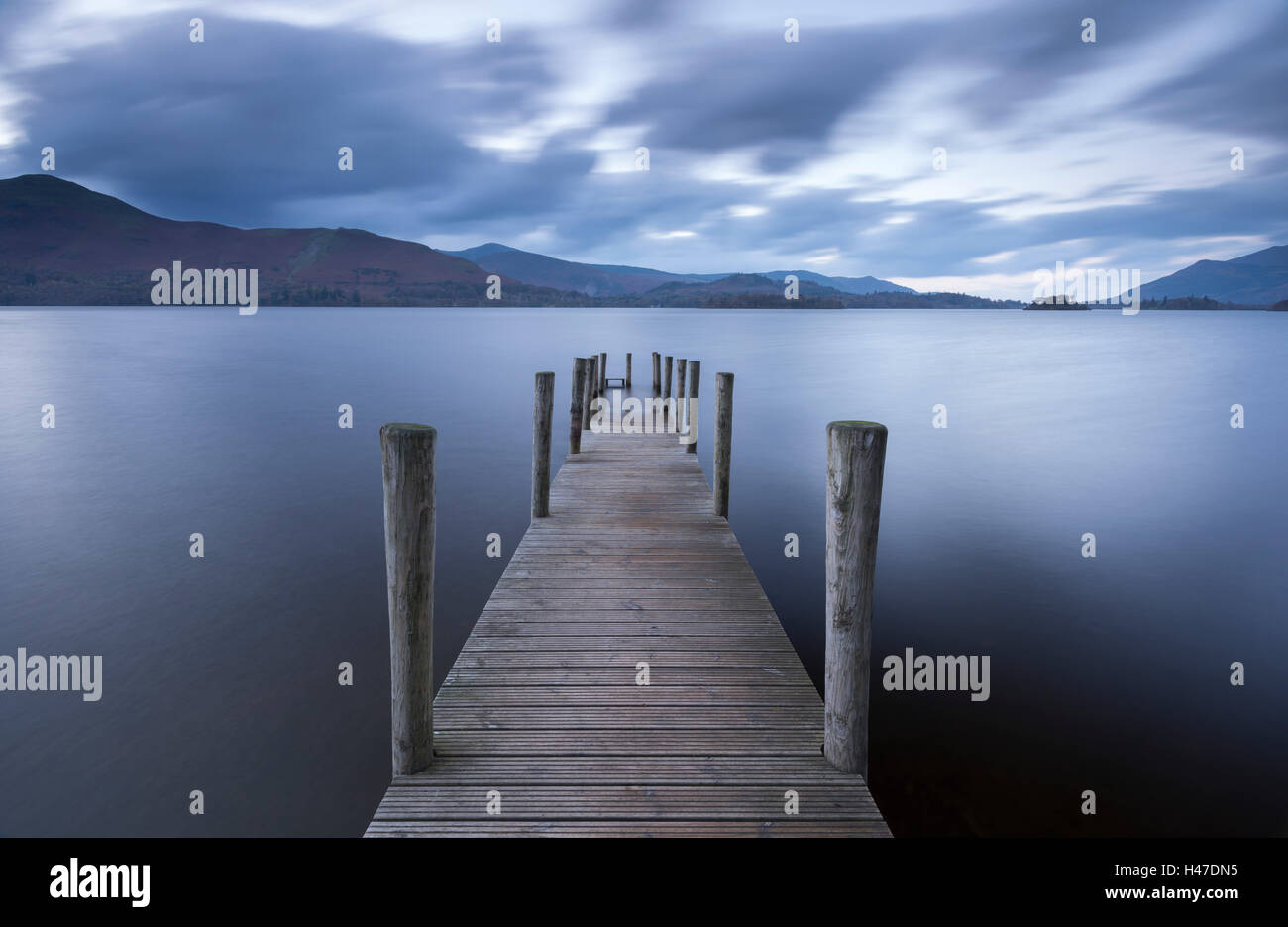 Wooden jetty on Derwent Water in the Lake District, Cumbria, England. Autumn (November) 2014. Stock Photo