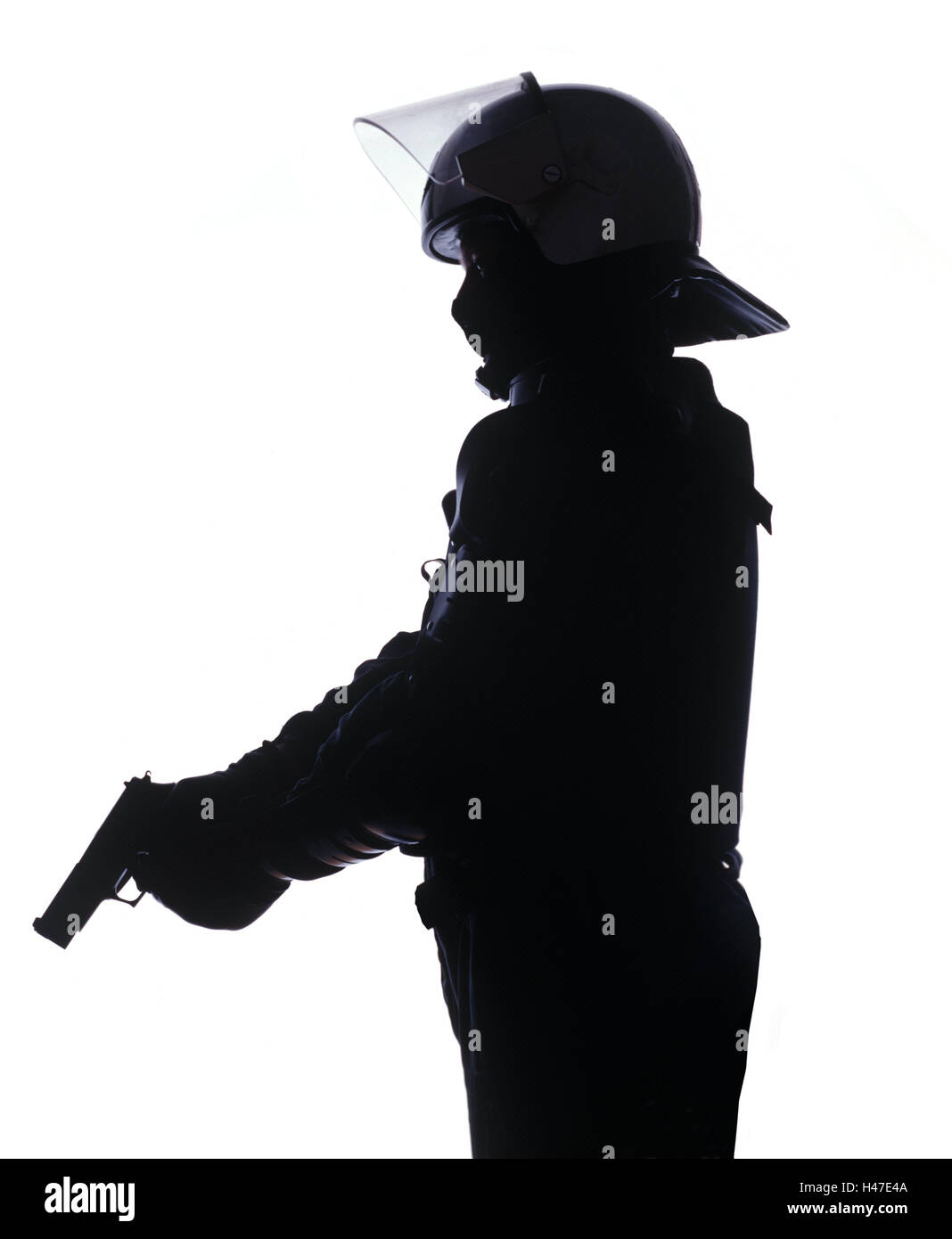 Policeman, protective clothing, gun, shooting practise, half portrait, side view, silhouette, police, occupation, man, official, police officer, uniform, protective clothing, protection, helmet, mask, protective mask, gun, SEK, MEK, GSG9, special task force, special unit, weapon, firearm, gun, counter-terrorism, Stock Photo