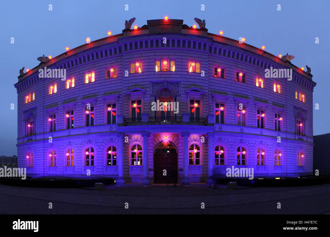 Berlin, Bertelsmann house, violet illuminated, stars of Bethlehem, panoramic format, Stock Photo