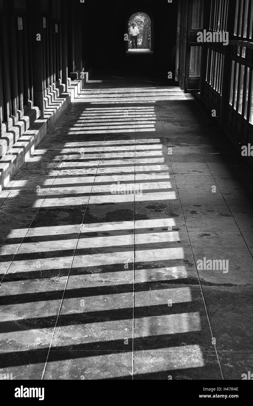 Corridor at rear of Hoa Khiem palace, Tu Duc mausoleum, Hue, Viet Nam.  Black and white version Stock Photo