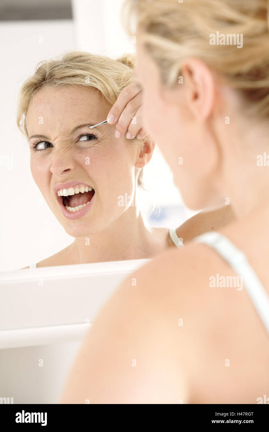 Woman, beauty, cosmetics, tweezers, pluck, painful, facial expression