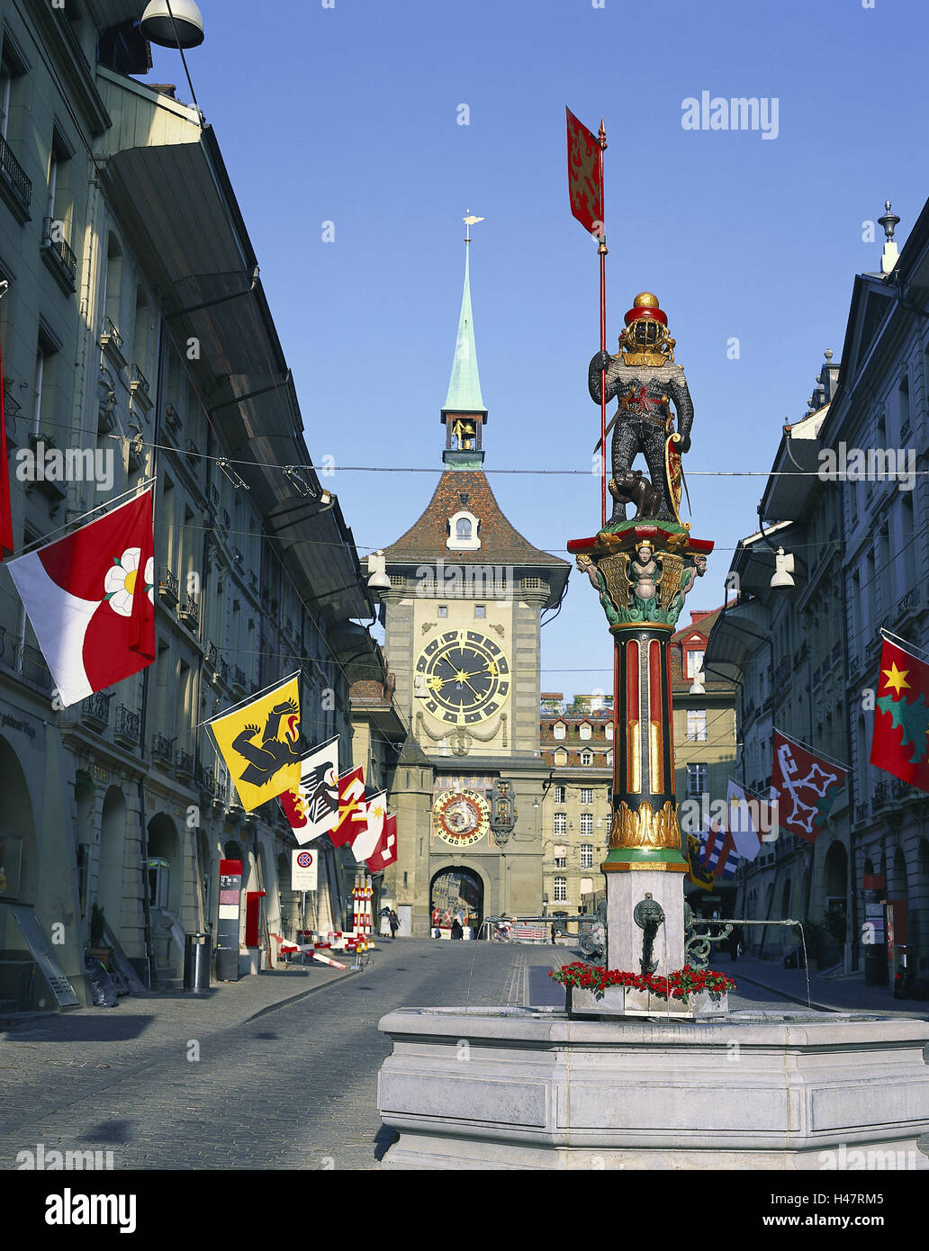 Switzerland, Bern, Old Town, junk lane, tough wrestler's well, time bell  tower, capital, town, town view, Zytglogge tower, Zytgloggeturm, west goal,  town goal, carillon, clock, astronomically, clock, houses, bear's wells,  wells, flags,