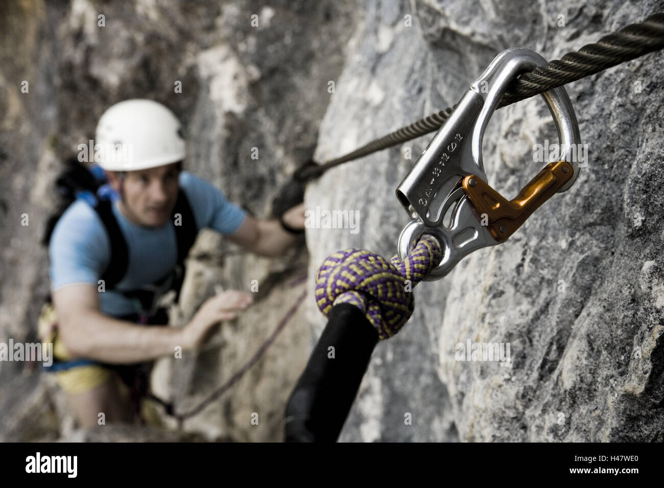 Mountaineers, climbing steep path, carbine, mountaineering, cliff face, climbing steep path, rock, man, cliff face, steeply, have a good head for heights, helmet, security, wire rope, stick, stop, slip, promotion, strain, mountains, nature, mountains, hig Stock Photo