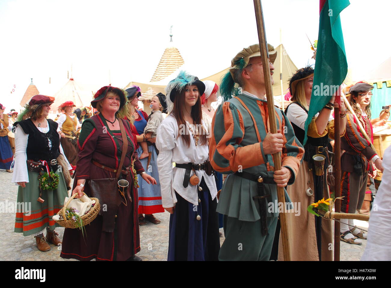 People dressed in medieval costumes take part in a parade during the ...