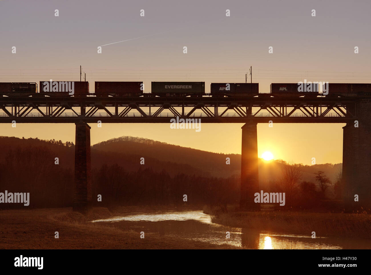 River, bridge, freight train, sunset, sun, sunshine, rail transport, container, Werra bridge, Werra, Oberrieden, Hessen, Germany, evening, evening mood, Stock Photo