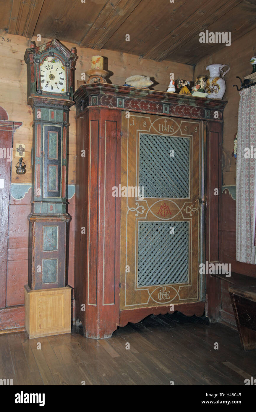 South Tyrolean farmhouse parlour, grandfather clock, lacteal cases, Italy, South Tyrol, Ultental, Ulten, room, residential room, clock, säulenformig, dial, cupboard, grid, cooling, annual number, in 1838, painting, wall, wooden caps, panelling, farm, farm Stock Photo