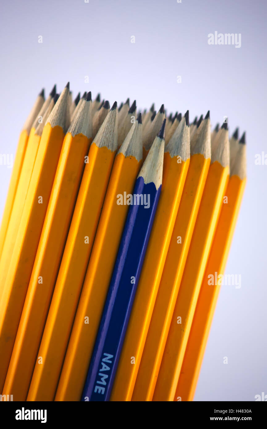 Yellow pencils collection with a pencil blue in the middle Stock Photo
