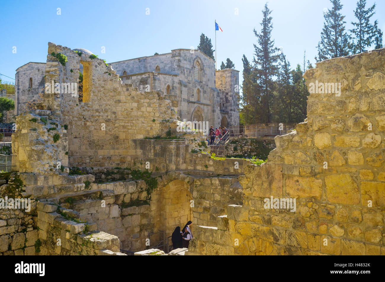 The ruins of the ancient Byzantine Basilica with the medieval Church of ...