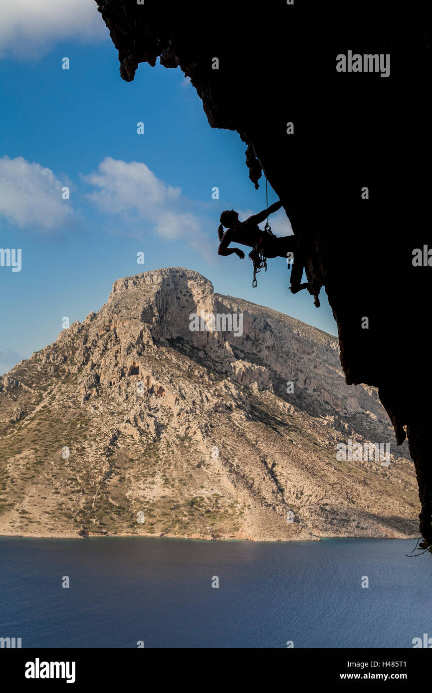 Aleksandra Ola Taistra, polish rock climbing athlete scaling the 7c route in Grande Grotta sector in Kalymnos island, Greece Stock Photo