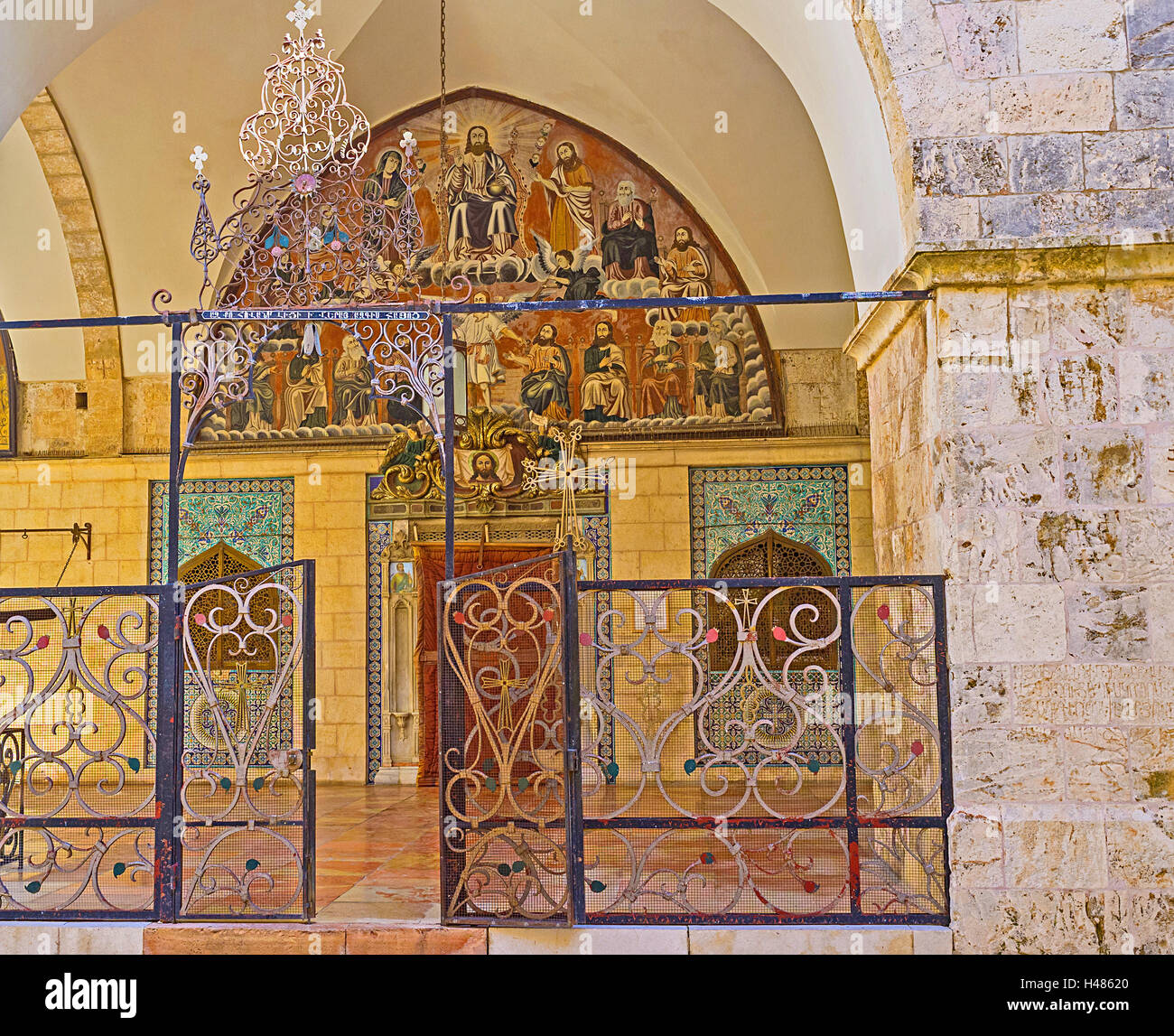 The courtyard of St James Cathedral in Armenian Quarter decorated with the metalwork and murals, Jerusalem, Israel Stock Photo