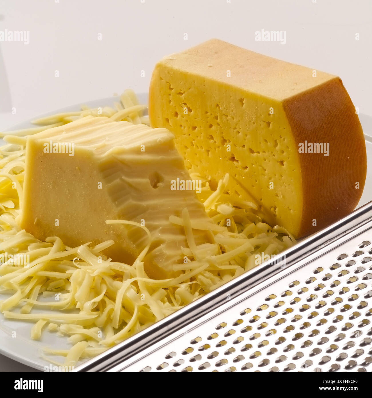 Grating cheese, Stock Photo