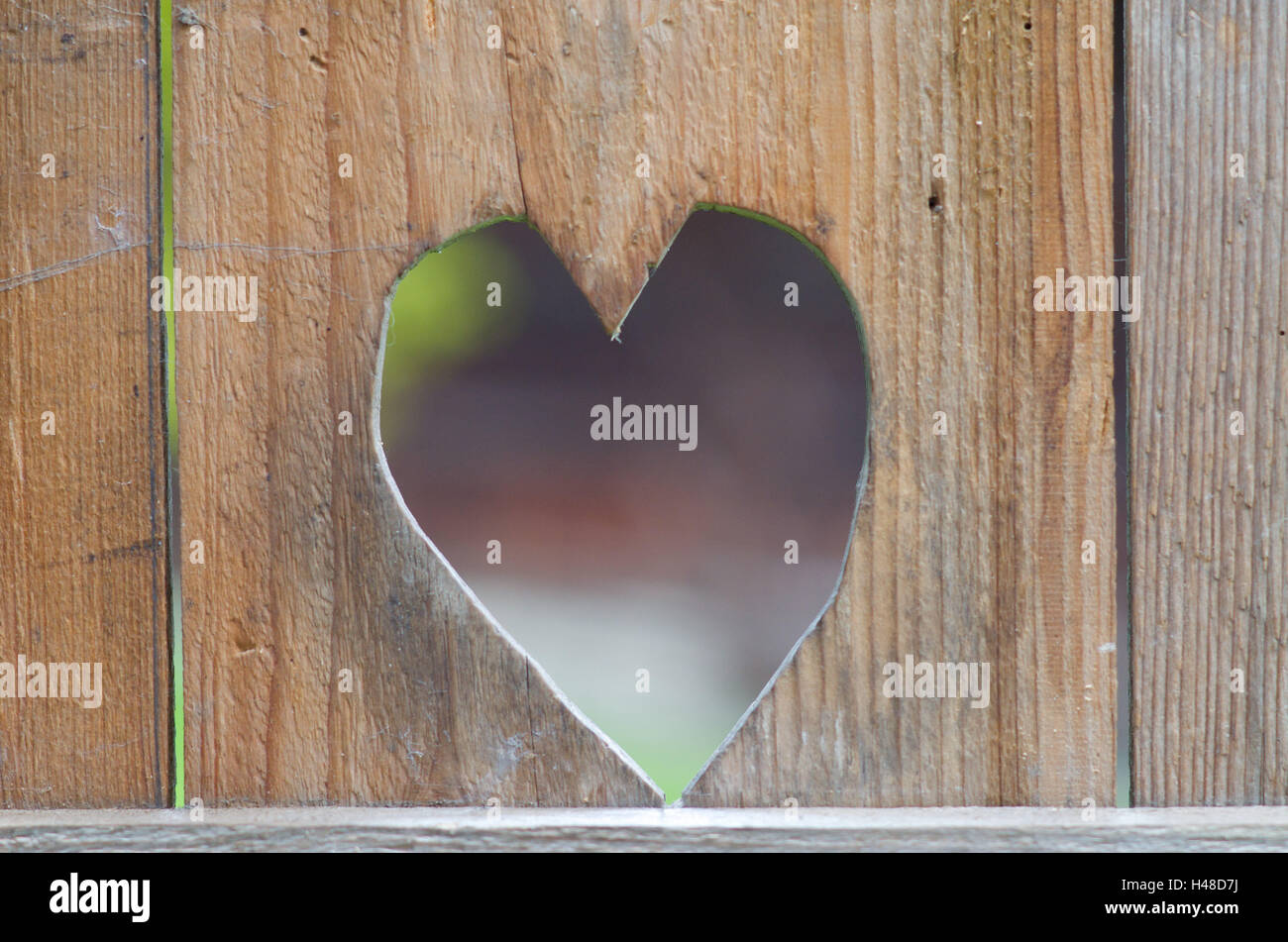 Heart in wooden wall, Stock Photo