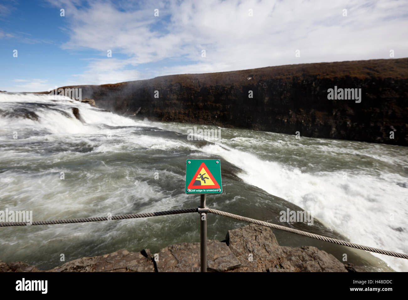 warning sign for dangerous cliff edge gullfoss waterfall in the golden circle Iceland Stock Photo