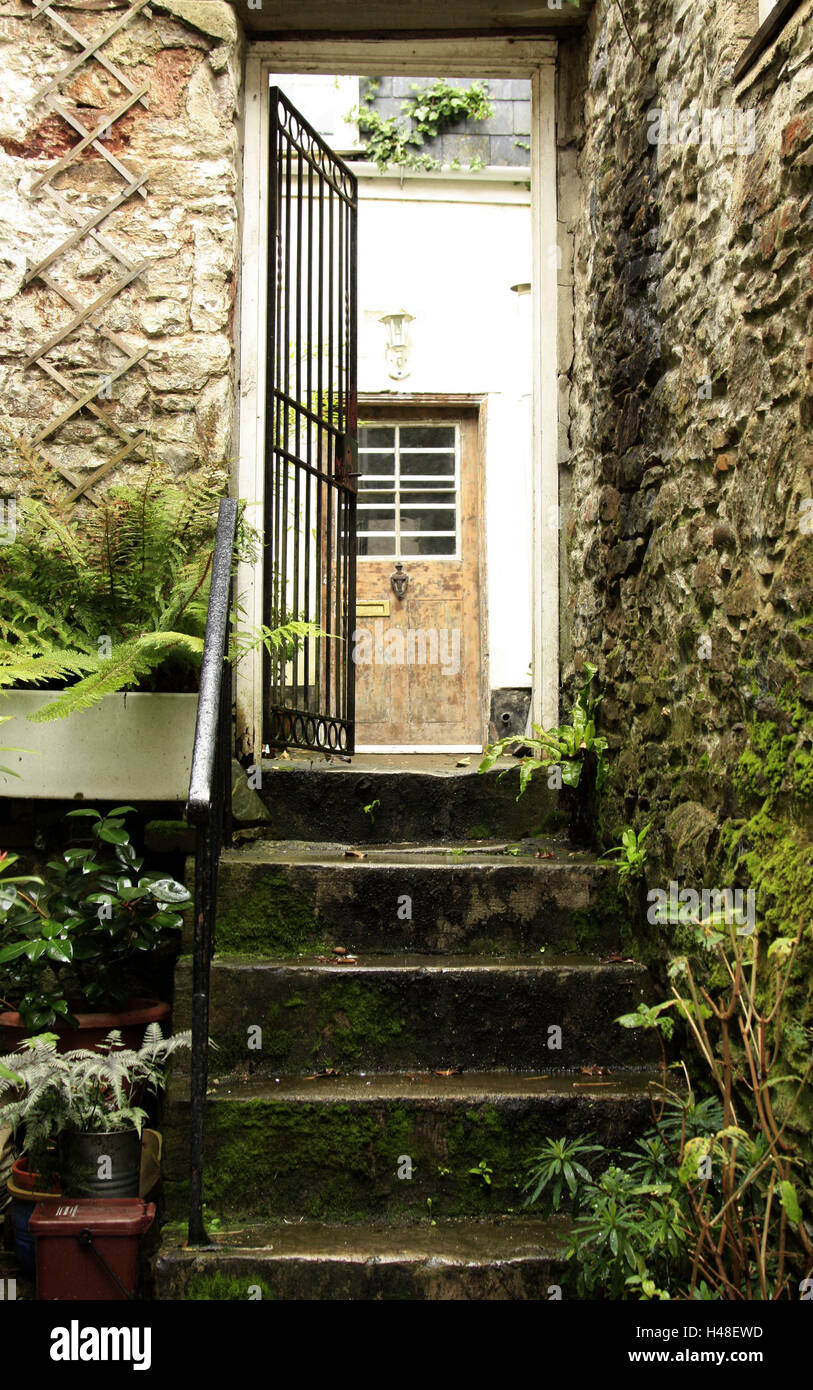 UK, Devon, Totnes, residential house, iron gate, entrance, backyard