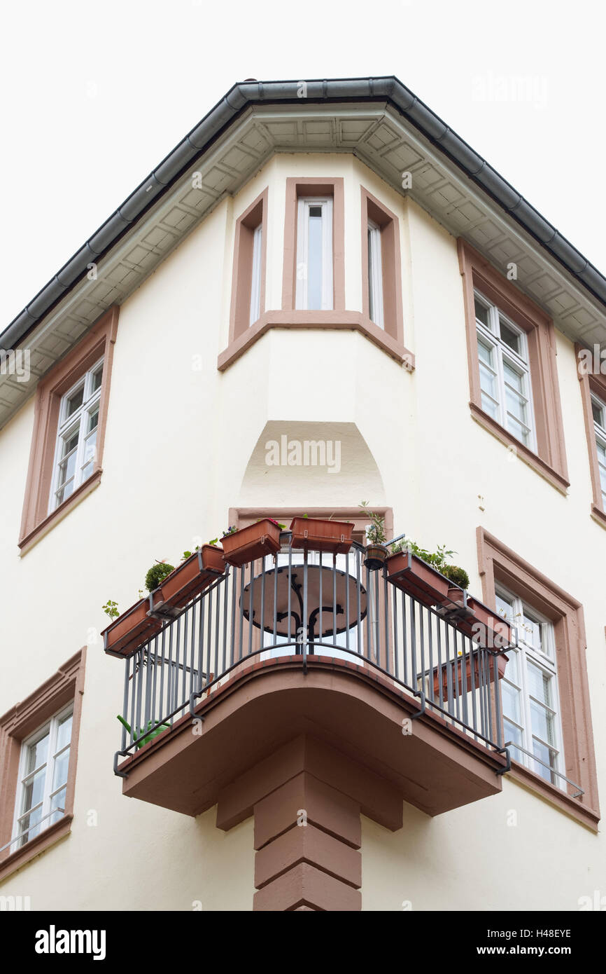 Old house with corner balcony, detail Stock Photo