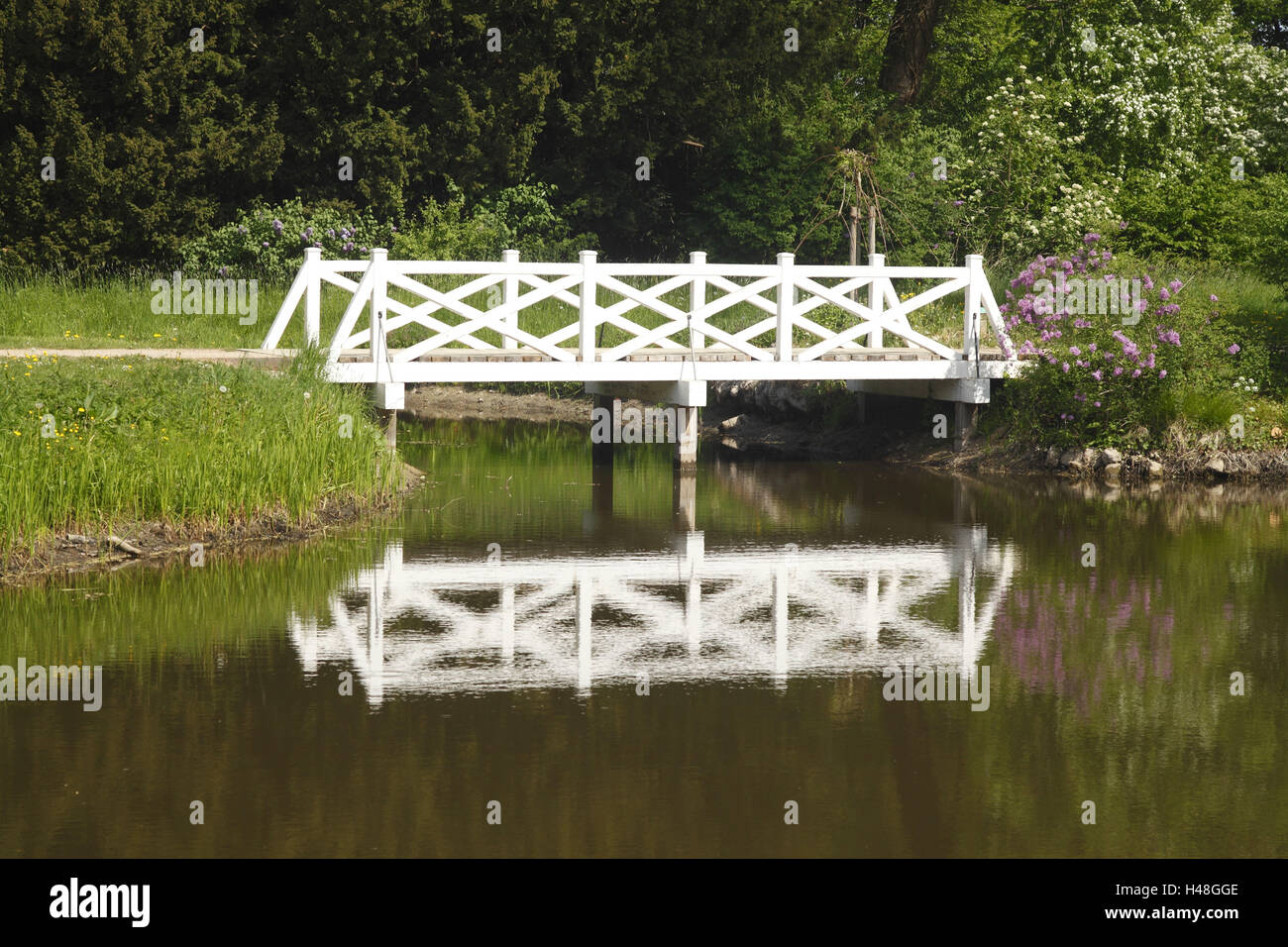 Germany, Schleswig - Holstein, Eutin, historical wooden bridge in the lock garden, Stock Photo