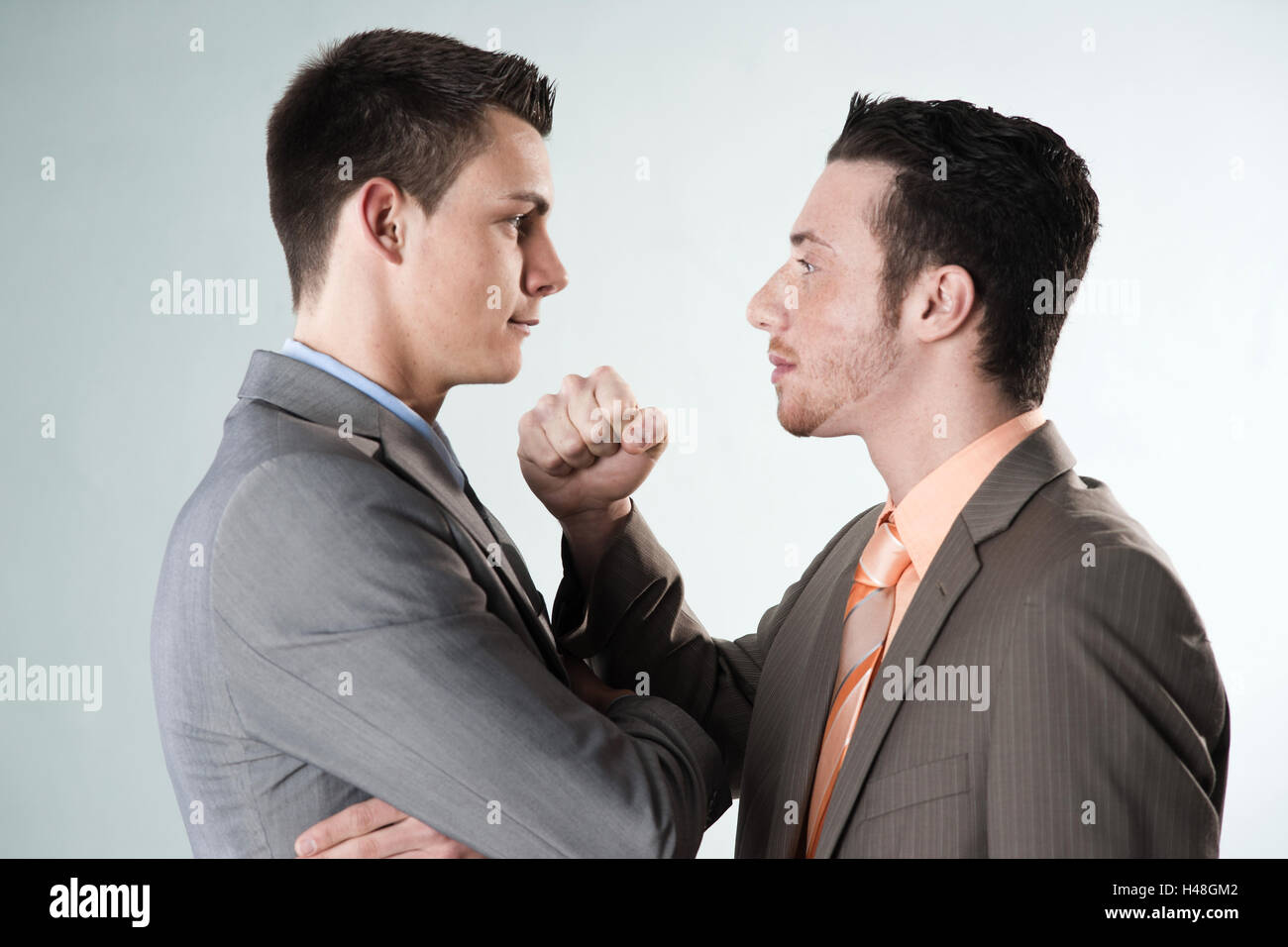 Two Jung's entrepreneurs face arguing, Stock Photo