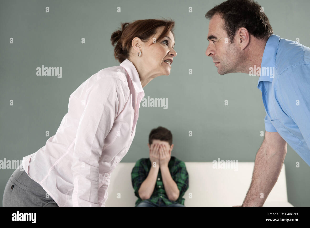 Nut and father argue before her child, Stock Photo