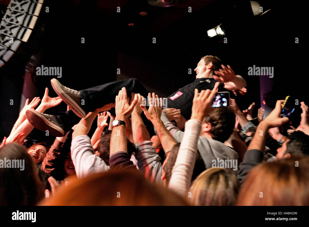 BARCELONA - MAR 18: The frontman of The Subways (rock band) performs with the crowd at Bikini stage. Stock Photo